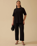 بلوزة بمقاسات كبيرة مزينة بتطريز بالخرز، من تصميم جالا-شي