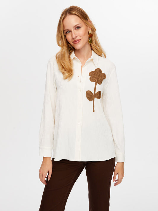 قميص مطرز بتفاصيل من تصميم فائق سونميز