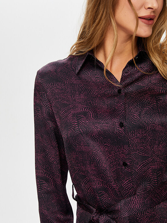 فستان قميص بأكمام طويلة بنقشة تجريدية من تصميم فائق سونميز